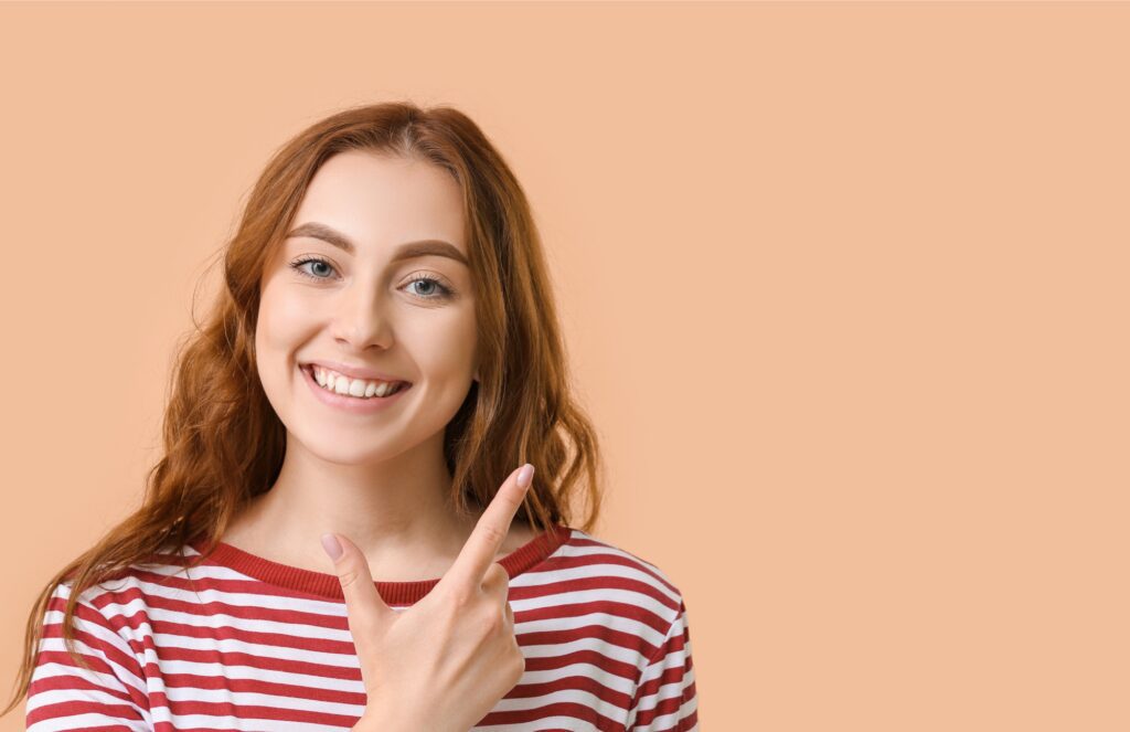 an image of a women satisfied and happy after periodontal treatment in Prestide Dental Spa in Lake Elsinore